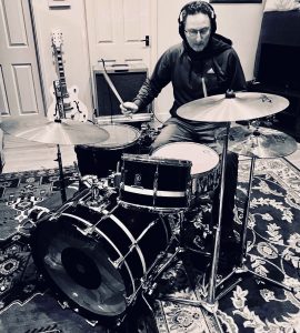 Olly in the studio on his Premier drums.